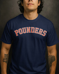 Person wearing a navy blue t-shirt with 'POUNDERS' printed in red.