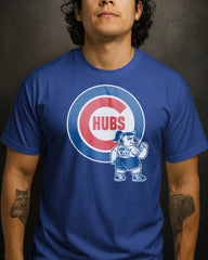 Person wearing a blue t-shirt with a bear graphic and 'HUBS' text on a dark background